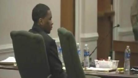 Laurence Lovette Jr. listens to testimony