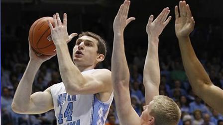 North Carolinas Tyler Zeller (44) shoots over Clemsons Tanner Smith during the first half of an NCAA college basketball game in Chapel Hill, N.C., Saturday, Feb. 18, 2012. North Carolina won 74-52.