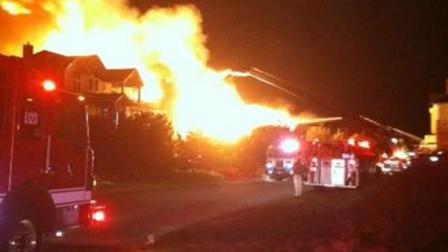 Two homes were destroyed and a third heavily damaged by a fire in the Pine Island area of Corolla in Currituck County.