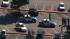 Police investigate at Cameron Village Monday.