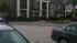 Crime tape up in front of a building at the...