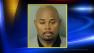 Former NCSU coach Sidney Lowe appears on a booking photo.