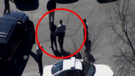 Officers arrest a woman in Durham after a chase Friday.