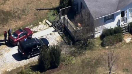 Authorities investigate a shooting in Elm City.