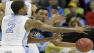Villanova guard Darrun Hilliard (4) passes around North Carolina guard Leslie McDonald (2) during the first half of a second-round game in the NCAA college basketball tournament Friday, March 22, 2013, in Kansas City, Mo.