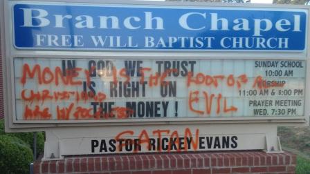 Graffiti marks the sign at the Branch Chapel Church on Highway 96 in Selma.