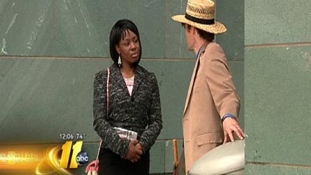 Crystal Mangum speaks with Durham attorney Scott Holmes.