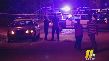 Police investigate on Bloodworth Street in downtown Raleigh.