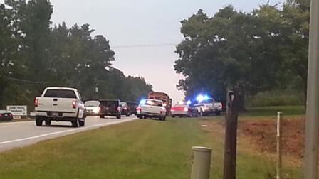 The North Carolina Highway Patrol reports no children were hurt when a car slid into the back of a school bus Friday morning.