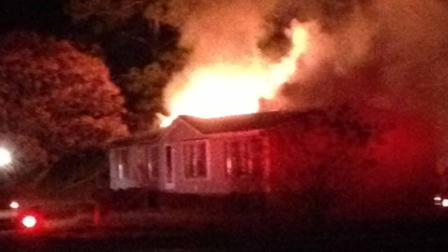 A mobile home went up in flames Tuesday evening.