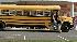 Kids getting on school bus