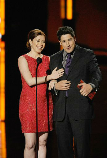 Alyson Hannigan and Jason Biggs on stage during...