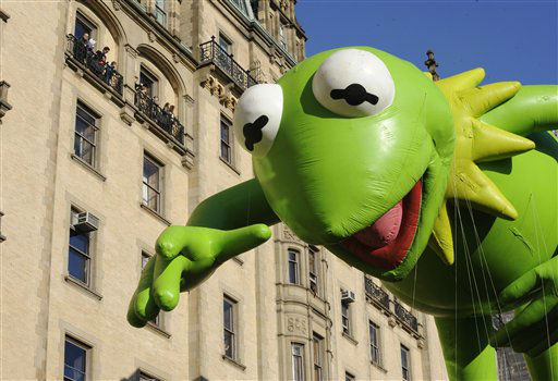 The Kermit The Frog balloon makes its way down...
