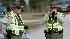 Two Onslow County sheriffs deputies stand guard...