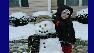 Local boy with snowman