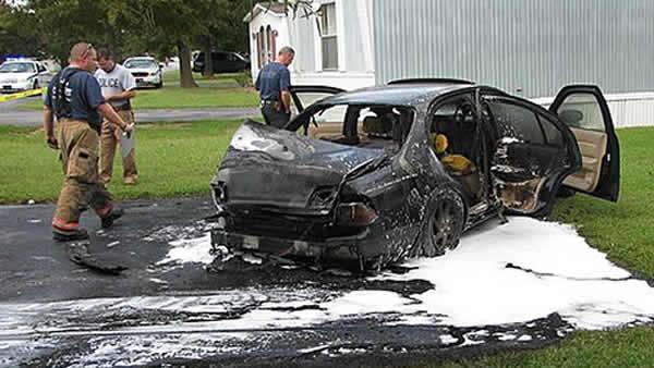 Firefighters put out the car fire (image courtesy WTSB Radio)