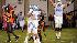 Virginia Techs Stephan Virgil (22) walks from the field as North Carolinas Casey Barth (11), Trase Jones, third from left, and Mike Ingersoll (66) celebrate Barths field goal on the games last play. (AP Photo/Don Petersen).