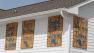 Anit-Hurricane Irene sayings are painted on John Olivers boarded up home in Atlantic Beach, N.C.