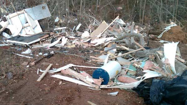 Debris from another trailer in Icard after Wednesday night's storms