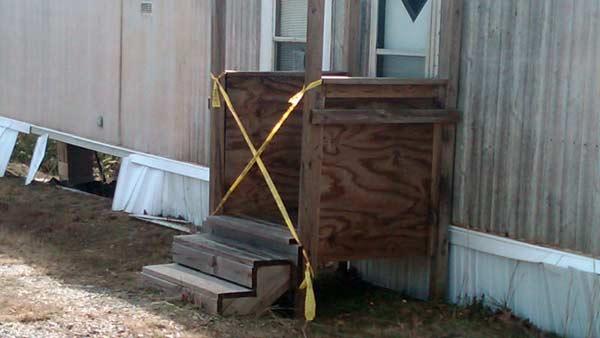 Debris from mobile home park in Icard after Wednesday night's storms