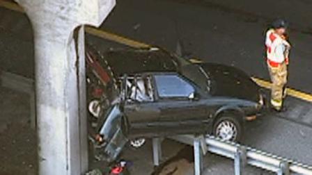 Both east and westbound lanes of Interstate 40 were backed up for almost an hour Friday after a car lost control and crashed under a bridge.