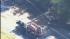 Truck carrying explosives overturns