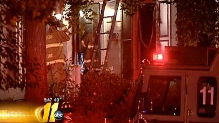 Two family dogs died in a house fire early Wednesday morning after their owners awoke to a fire alarm