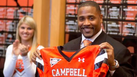 Campbell has hired former Carolina Panthers safety Mike Minter as its football coach.