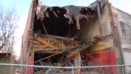 The owner has decided to demolish the front portion of the building that is more than 100 years old.