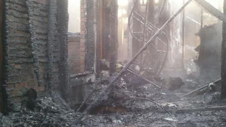 The family of five was able to escape the home unharmed, but the house is a total loss