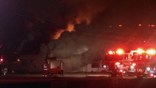 Firefighters battle fire at an abandoned building in the 4600 block of Old Poole Road in Raleigh just before 4:30 a.m.