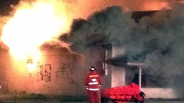 Firefighters battle fire at an abandoned building in the 4600 block of Old Poole Road in Raleigh just before 4:30 a.m.