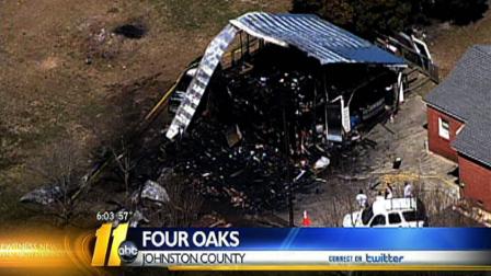 The fire began Saturday morning in the barn behind a home on N.C. Highway 301 South in Four Oaks.
