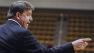 Chattanooga head coach Wes Moore gives instructions to his players in the first half of an NCAA college basketball game against Davidson during the Southern Conference tournament on Monday, March 11, 2013 in Asheville, S.C.