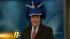 Don Big Weather Schwenneker shows off dinosaur hat from Museum of Life and Science in Durham
