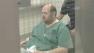 Jon Broyhill brought to the Wake County Detention Center after being released from WakeMed hospital.