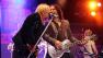 Joe Elliott, left, and Vivian Campbell perform with the band Def Leppard at the after party for the Rock of Ages premiere on Friday June 8, 2012, in Los Angeles.