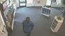 Police say the suspect acted as if he were a customer then made out with several iPhones.