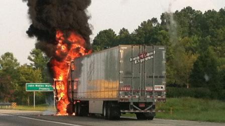 Traffic was backed up for miles along Interstate 40 in Durham County Wednesday morning after a tractor-trailer caught on fire.