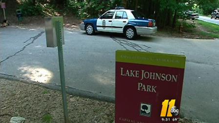 The body was found Saturday morning around 8:15 a.m. along a walking trail at Lake Johnson