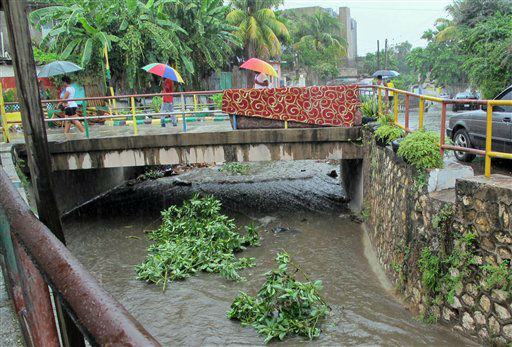 Rain brought by the outer bands of Tropical...