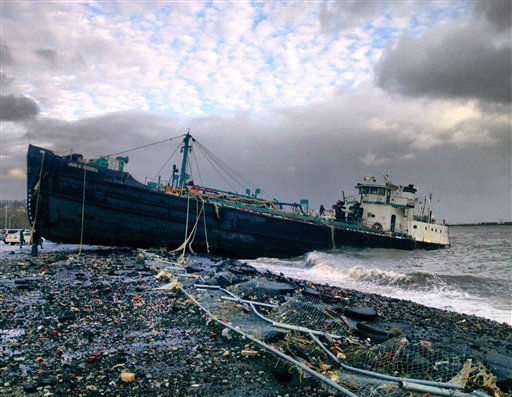 A 168-foot water tanker, the John B. Caddell,...