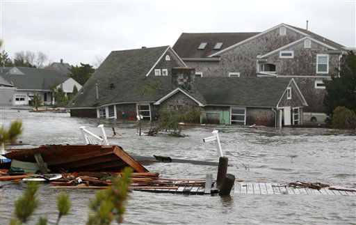 Floodwaters surround homes near the Mantoloking...