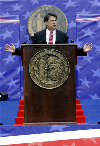 North Carolina Gov. Pat McCrory is sworn in by...
