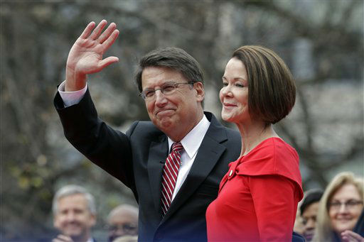North Carolina Gov. Pat McCrory is sworn in by...