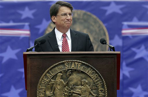 North Carolina Gov. Pat McCrory is sworn in by...