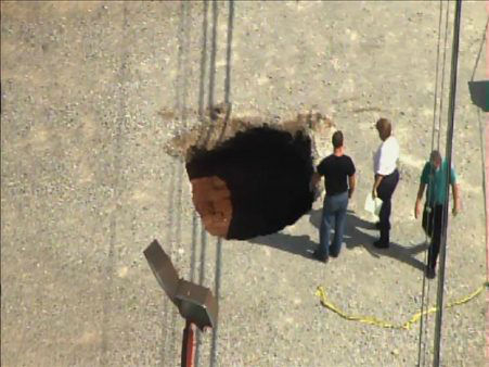 A sinkhole formed Tuesday afternoon near the...