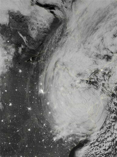 This image provided by NASA shows the eastern seaboard of the United States of America at night from a composite assembled from data acquired by the Suomi NPP satellite as Hurricane Sandy came ashore on Oct. 30, 2012.