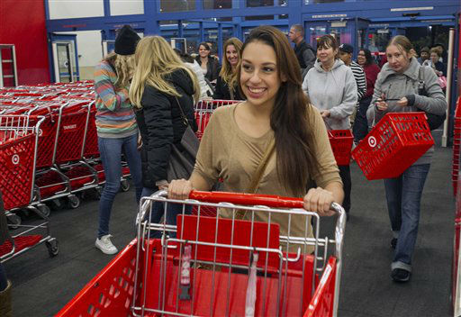 Shoppers rush to looking for doorbuster deals at...