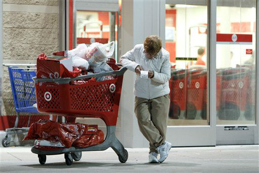 Betsy McGonagle checks her receipt after...